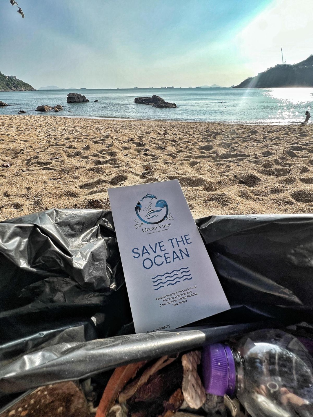 Beach cleanup briefing with OceanVines team